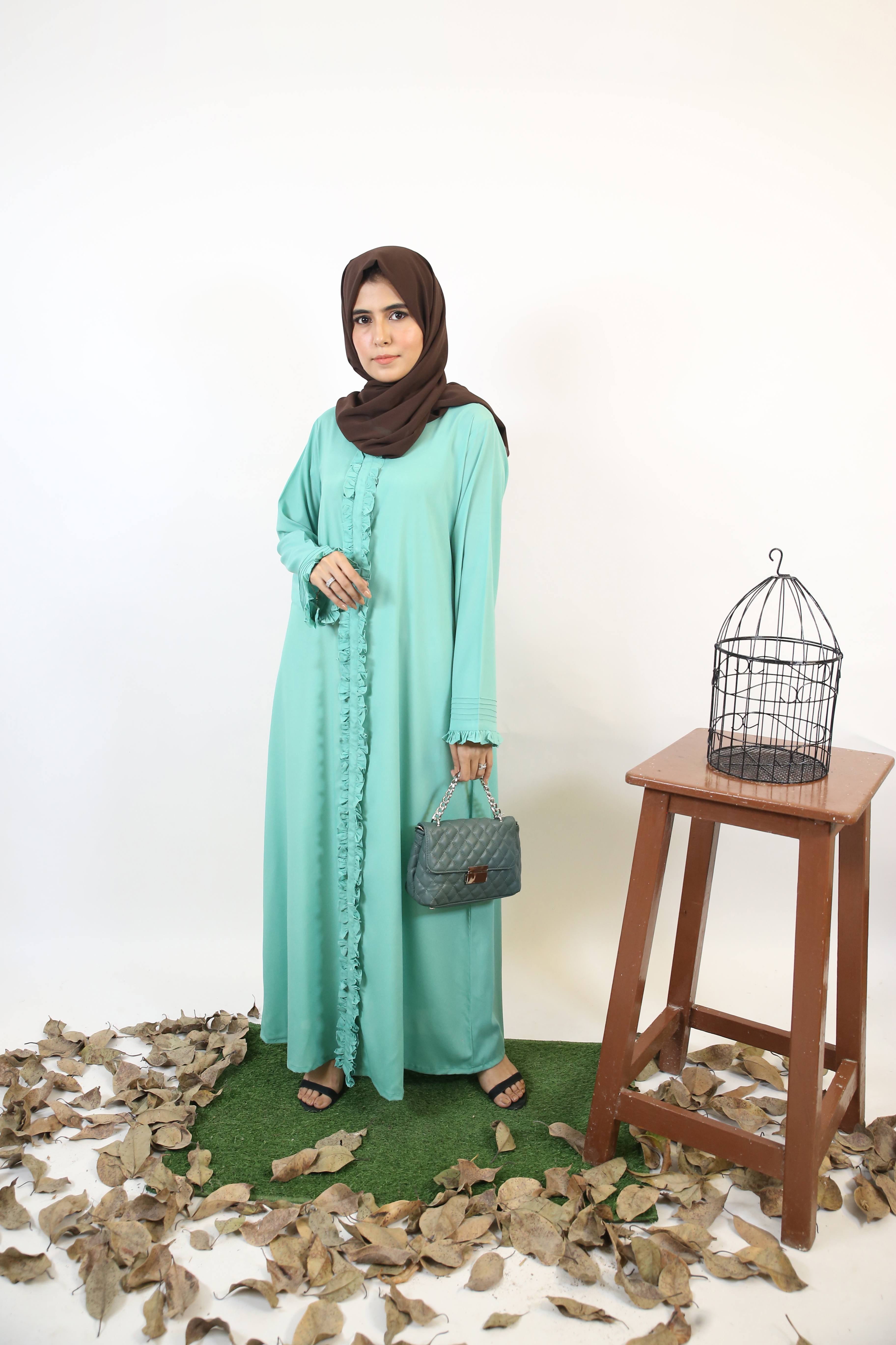 Naseem Ethereal Maxi abaya with pleated sleeves and full length Ruffled Mint Green